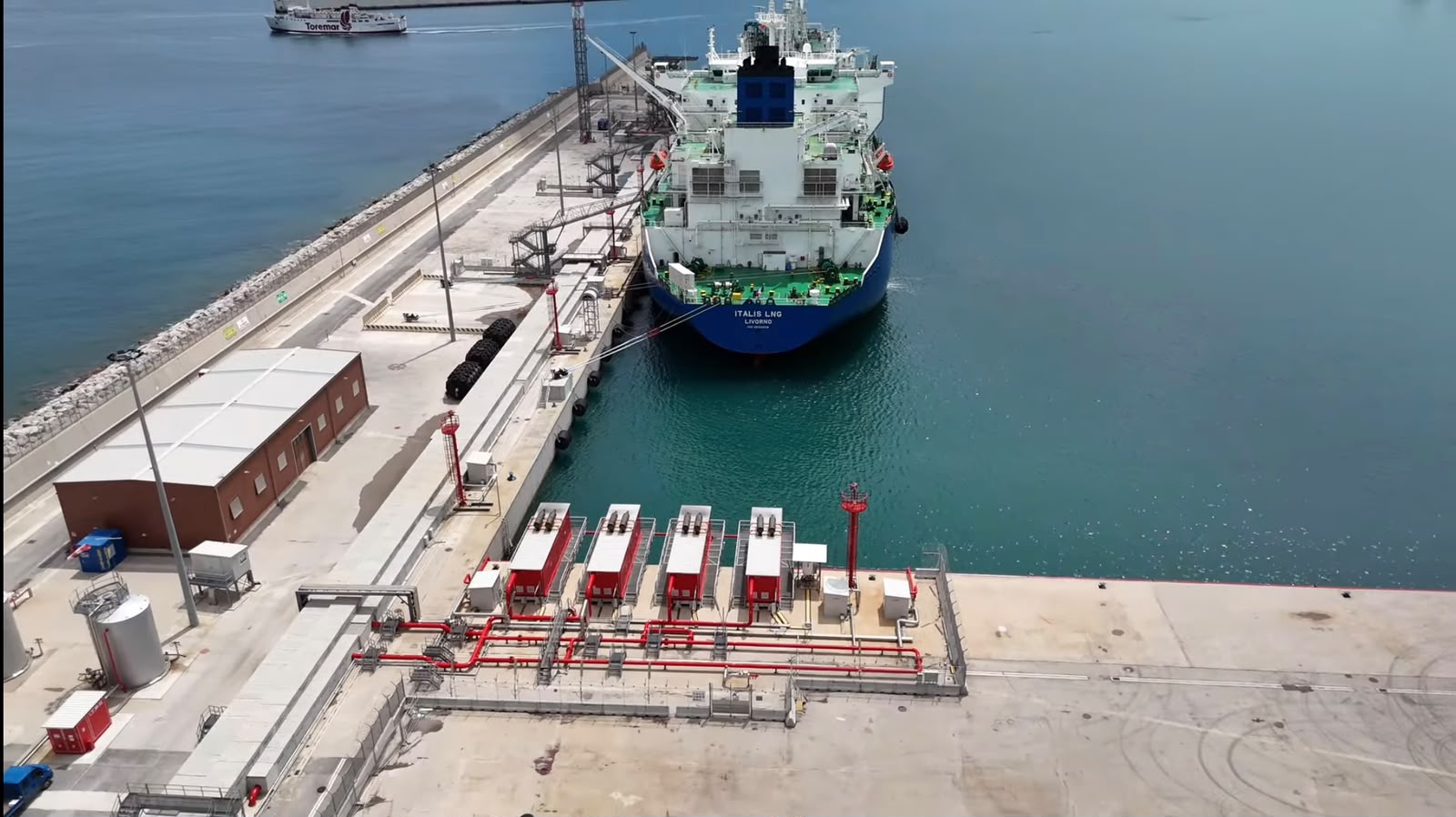 LNG port facility with integrated systems and technical lines along the quay